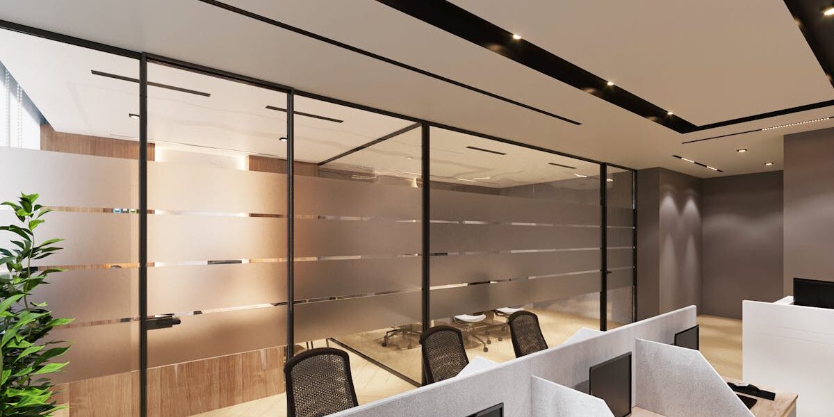 A modern London corporate office with a glass partition